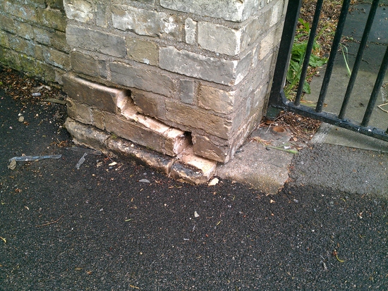 All Saints' church wall after been hit